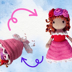 May include: A crocheted doll wearing a pink dress with a red bodice and a flower crown. The doll is holding a crocheted bouquet of flowers in a pink wrapper.