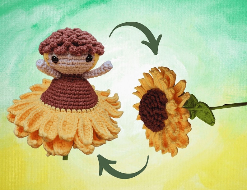 May include: A crocheted sunflower doll with a brown head and dress, yellow petals, and outstretched arms. The doll is shown next to a crocheted sunflower. The background is a watercolor wash of green and yellow.