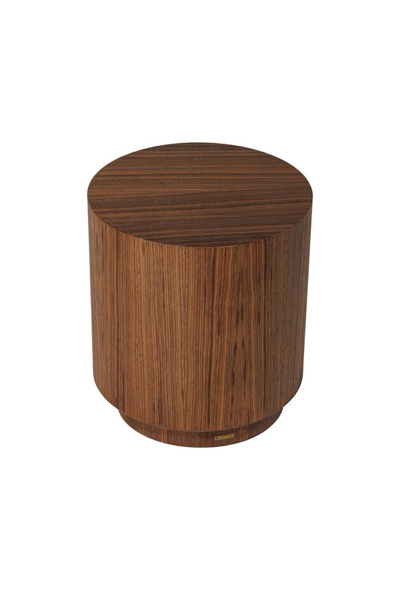 May include: A cylindrical wooden side table with a rich, dark brown wood grain finish. The table has a flat top and a slightly wider base, creating a sturdy and modern design. The wood grain is vertical, adding visual interest.