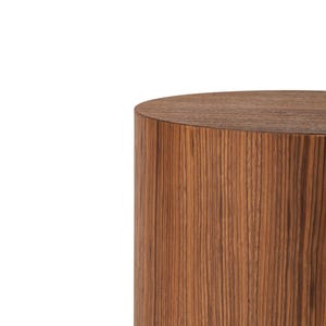 May include: A cylindrical wooden side table with a flat top. The table is made of a dark brown wood with vertical grain patterns. The design is simple and modern, suitable for various interior styles.