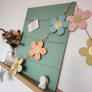 Garland of 7 colorful flowers made from recycled paper and golden Lokta