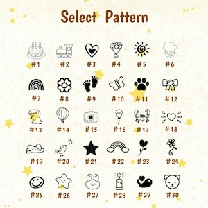 Pu&ograve; includere: Immagine con il testo "Select Pattern" sopra una griglia di 30 illustrazioni in bianco e nero. Le illustrazioni includono una torta, un treno, un cuore, fiori, un sole, nuvole, un arcobaleno, un fiore, impronte, una farfalla, un'impronta di zampa e un fiocco.