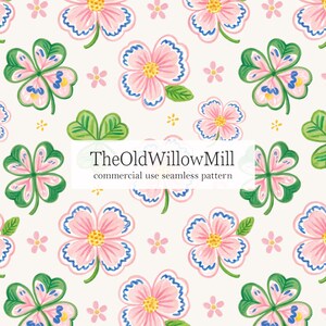 May include: A seamless pattern featuring pink flowers with yellow centers and blue-outlined petals, interspersed with green four-leaf clovers and small pink blossoms on a cream background. Text reads TheOldWillowMill commercial use seamless pattern.