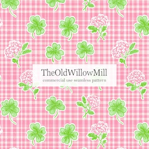 May include: A seamless pattern featuring green four-leaf clovers and pink hydrangea flowers on a pink and white gingham background. The text "TheOldWillowMill commercial use seamless pattern" is displayed in a white rectangle.