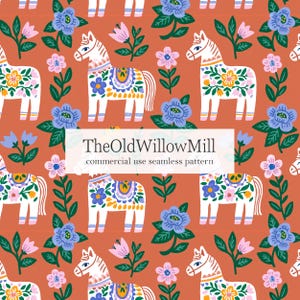 May include: Seamless pattern featuring white horses with floral designs in blue, yellow, and pink, set against a terracotta background. The pattern includes flowers and foliage. Text: TheOldWillowMill commercial use seamless pattern.