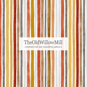 Puede incluir: Patrón sin costuras con rayas verticales de acuarela en tonos naranja, amarillo, marrón y gris. El texto "TheOldWillowMill commercial use seamless pattern" se muestra en un rectángulo blanco.