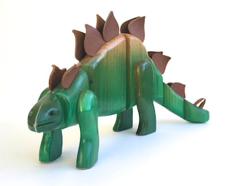 Vintage Articulated Wood Stegosaurus Toy: Hand-Carved & Painted Dinosaur