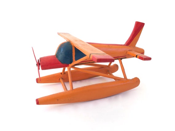 orange toy plane