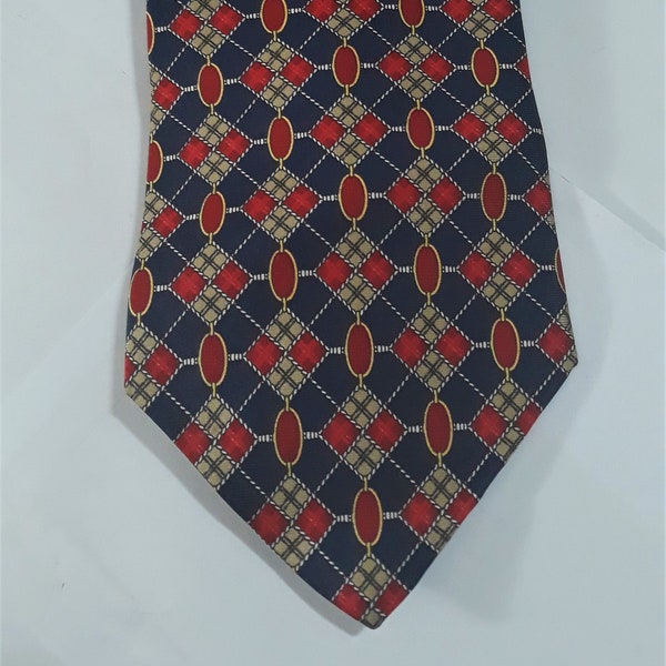 Paolo Gucci Genuine Tie 1990s and 100% Silk 4" width and 1 1/2" on the other end Quality Made in Italy Hand Finish