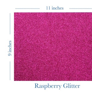 May include: A sheet of raspberry glitter heat transfer vinyl, measuring 11 inches by 9 inches. The vinyl is a deep pink color with a fine glitter finish. The text "Glam Flex" is visible in the image.