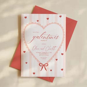 May include: A Galentine's Party invitation with a pink and white striped background. The invitation features a heart-shaped design with the words "Galentine's Party" in cursive script. Small red hearts are scattered around the invitation, and a red envelope is behind the invitation.