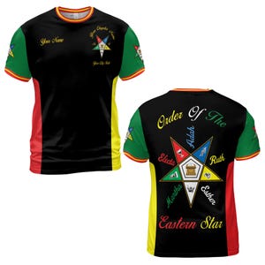 May include: Black t-shirt with red, yellow, and green accents. The front features text that says "Your Name" and "Your City Side". The back of the shirt displays "Order Of The Eastern Star" and a star graphic.
