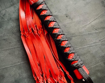 Handcrafted red leather flogger — Senketsu — stained wooden handle, tsukamaki, unique handmade BDSM piece