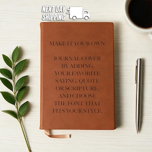 May include: A rectangular brown journal cover with a smooth texture. The front features black text that reads: MAKE IT YOUR OWN JOURNAL COVER BY ADDING YOUR FAVORITE SAYING, QUOTE OR SCRIPTURE, AND CHOOSE THE FONT THAT FITS YOUR STYLE.