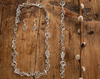 Silver Squiggle Necklace, with optional Bracelet and Earrings