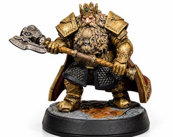 May include: A detailed figurine of a dwarf king, clad in golden armor and a crown. The dwarf holds a battle axe with a silver head and wooden handle. The figure stands on a round base with a stone-like texture.