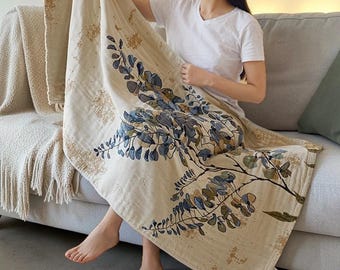 Manta decorativa floral, muselina orgánica, 100% algodón: suave, transpirable y acogedora.