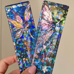 May include: A set of three ceramic mugs with a speckled, matte finish. The mugs are in shades of cream, light gray, and dark gray. Each mug has a simple, minimalist design, perfect for coffee or tea.