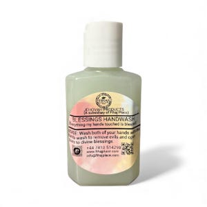 May include: A hexagonal handwash bottle with a white cap. The label reads "BLESSINGS HANDWASH" and includes usage instructions. The bottle has a light green liquid inside and a colorful label with contact information.