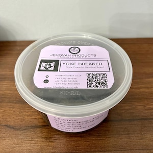 May include: A white plastic container with a black lid. The lid has a label that says "Jehovah Products" and "Yoke Breaker (Very Powerful Spiritual Soap)". The label also includes contact information and a QR code.