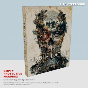 May include: An empty protective hardbox for a Steelbook case featuring the title Annihilation and Natalie Portman. The cover art displays a skull integrated with forest elements, trees, and figures. The box has a 2mm rigid construction.