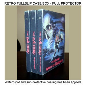 May include: A retro fullslip case/box with three film cases. The cases are dark blue with the text "THE EVIL DEAD" and "ARMY OF DARKNESS". The right-most case has a skull graphic. The text "Waterproof and sun-protective coating has been applied."