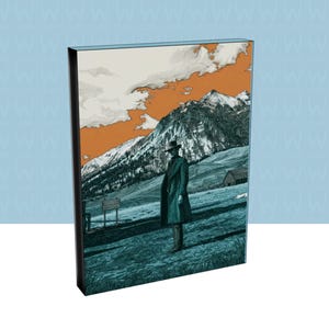 May include: A framed art print depicting a man in a long coat and hat in a mountain scene. The artwork uses teal, orange, and white tones, with a vintage style. The print is set against a light blue backdrop.