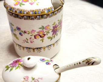 Dúo de ollas y sartenes con tapa floral 'Malvern' de Royal Grafton, década de 1950