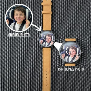 May include: A personalized watch with a tan leather strap and a black watch face. The watch face features a cartoon image of a child. The image also shows the original photo and the cartoonized photo with the text "ORIGINAL PHOTO" and "CARTOONIZE PHOTO".