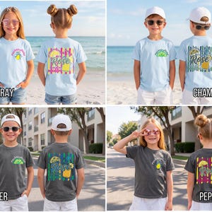 May include: Light blue and dark grey t-shirts with front and back graphics. The front of the light blue shirts have a lemon graphic and the text "Rockin' by the Shore". The back of the light blue shirts have a "Rose" graphic. The dark grey shirts have the same graphics.