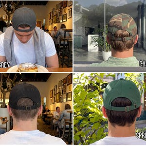 May include: Four baseball caps in different colors: dark grey, camo, black, and spruce green. Each cap has a curved brim and an adjustable metal buckle closure at the back. The caps are shown from the back, with the text "DARK GREY", "CAMO", "BLACK", and "SPRUCE" below each.
