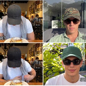 May include: Four baseball caps in dark gray, camo, black, and spruce green. Each cap is shown on a person wearing sunglasses. The caps are made of a soft material and have a curved brim.