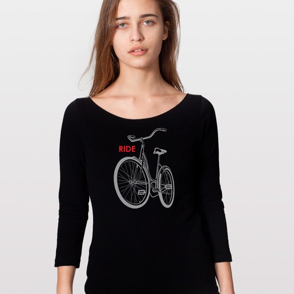 Women's black Bike t-Shirt Light Reflective Schwinn Bicycle cotton long sleeve shirt reflector and red ink, great gift for bike enthusiasts.