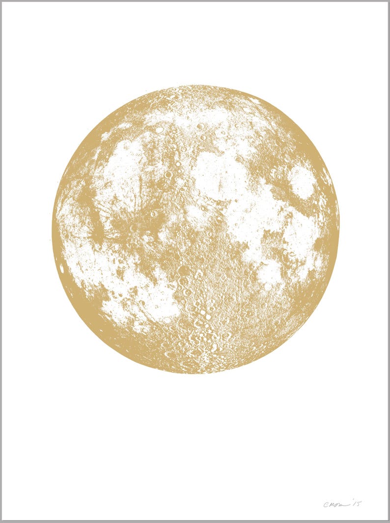 May include: A gold-colored illustration of the moon with a detailed surface texture.