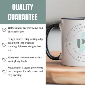 May include: White ceramic mug with a black handle and rim. The mug has a logo on the side and the text "QUALITY GUARANTEE". The mug is suitable for microwave and dishwasher use.