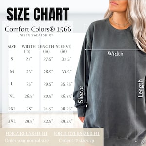 May include: Size chart for a Comfort Colors 1566 unisex sweatshirt. The chart shows measurements for width, length, and sleeve length in inches for sizes S to 3XL. The chart also includes recommendations for a relaxed or oversized fit.