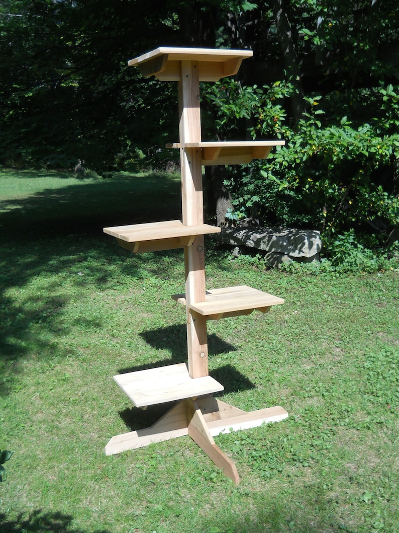5 Platform Perch Cedar Wood Outdoor Cat Tree is perfect for the feline that really likes to climb tall heights.