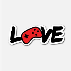 May include: A black and white graphic of the word "LOVE" with a red video game controller replacing the "O".