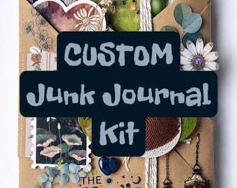 May include: A brown paper envelope containing a junk journal kit with various paper ephemera, stickers, and decorative charms. The front features the text "CUSTOM Junk Journal Kit" and "THE Magic is in YOU" with illustrations of lanterns, flowers, and a butterfly.