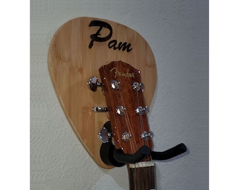 Custom Guitar hanger shaped like a guitar pick  Bamboo and personalized with your name.  Custom-made original design from 3DCarving on Etsy.