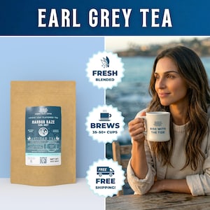 May include: A bag of loose leaf Earl Grey tea, labeled "Harbor Haze," with the text "Artisan Tea." The image also features a mug with "Rise with the Tide" printed on it, and the words "Fresh Blended" and "Brews 35-50+ Cups."