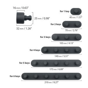 May include: A series of black key holders, each designed to hold a different number of keys. The holders range in size from 4 cm to 21 cm long, with options for 1 to 6 keys. The image also shows a single key holder that is 3.2 cm long.