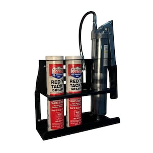 May include: A black metal grease gun holder with two cans of Lucas Red 'N' Tack Grease and a grease gun. The cans are red and white with black text. The grease gun is silver and black.