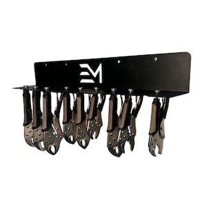 May include: A black metal tool holder with a white logo, holding multiple locking pliers. The pliers are silver and black. The tool holder is designed to organize and display tools.