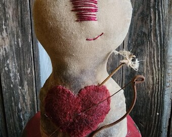 Primitive Valentine Cupid, ornie, tuck, stump doll.