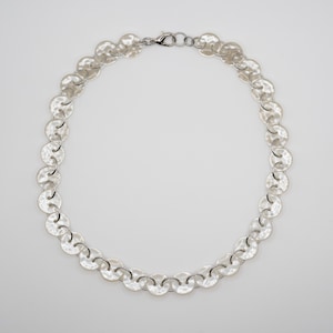 collar de botones de nácar