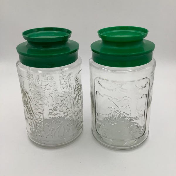 Set of two vintage Anchor Hocking for Tang glass canister jars with green plastic lids. Set of 2 Jars. Jar themes: summer & lilies of Valley