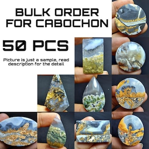 May include: A selection of 50 cabochons in diverse forms, such as round, teardrop, and rectangular. The cabochons display a blend of colours, including grey, white, gold, and green, with distinctive patterns. The image includes the text "BULK ORDER FOR CABOCHON" and "50 PCS".