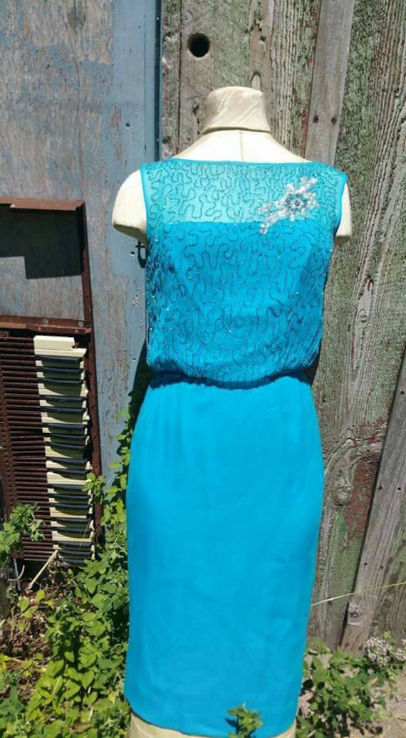 Pretty turquoise late 50's early 60's  designer wi