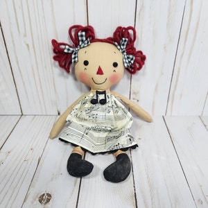 Handmade Tiny Raggedy cloth doll in Music Notes themed Dress, Music teacher gift, Homespun from the Heart doll